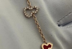 Qeelin Wulu  sautoir bracelet in 18K rose gold with diamonds and red enamel
